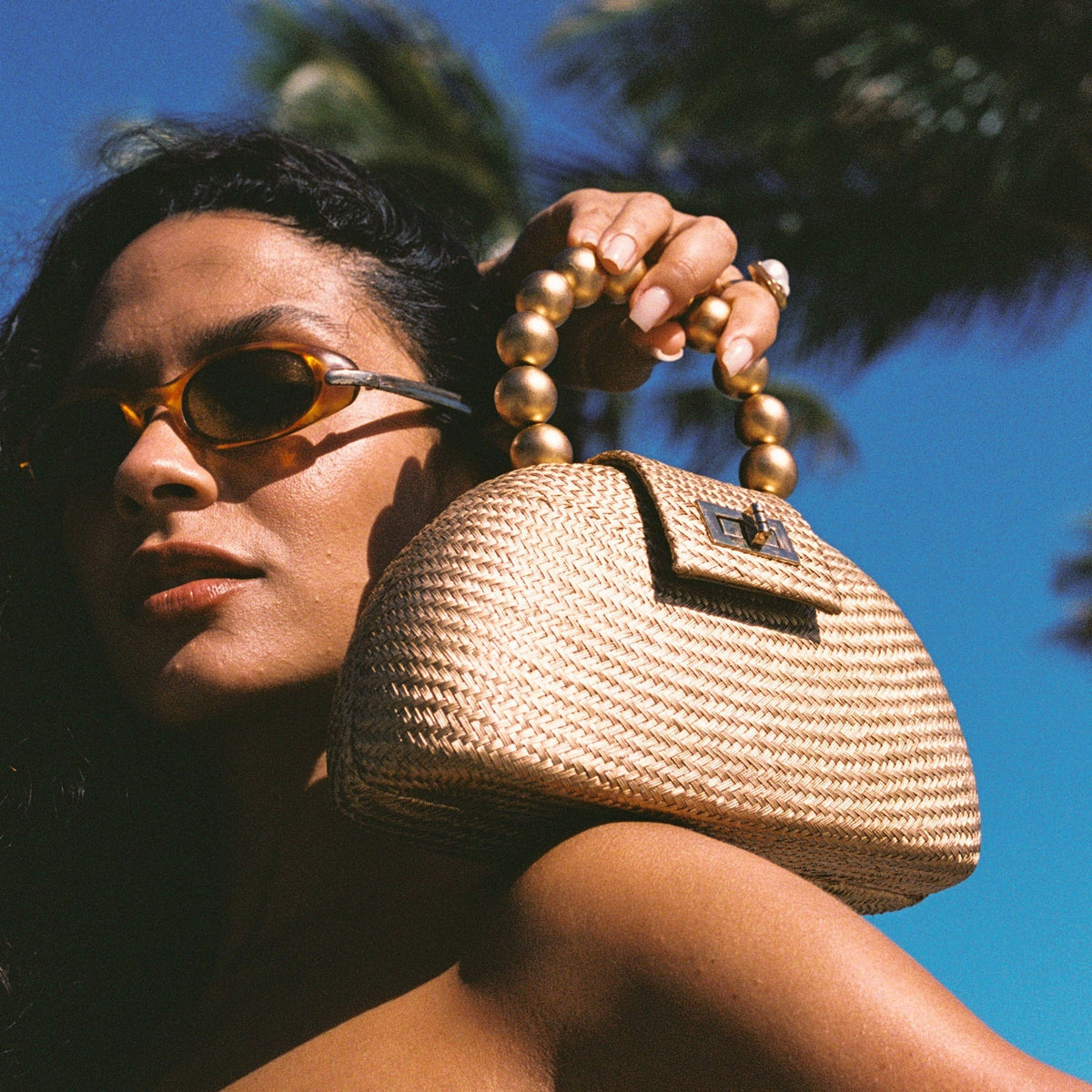 THE ORLA Gold Woven Straw & Wooden Bead Statement Clutch Bag